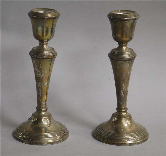 A pair of modern silver candlesticks, 20cm.